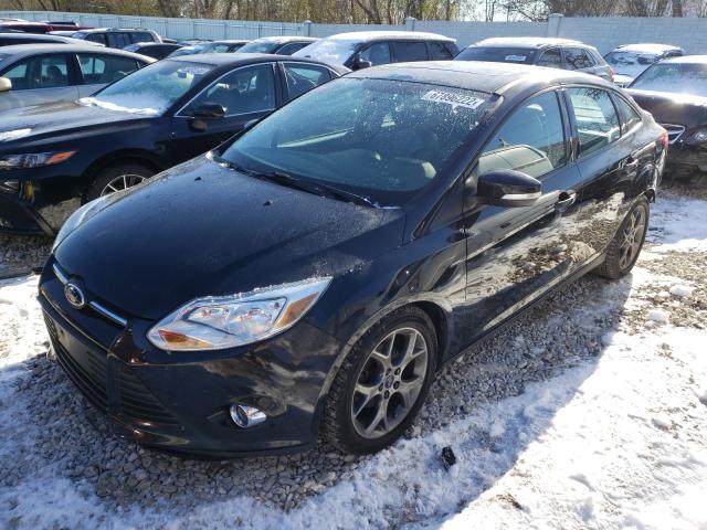 FORD FOCUS SE 2014 with VIN 1FADP3F24EL339590 - Photo from auction