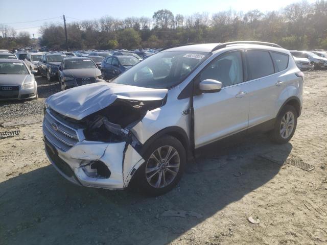 FORD ESCAPE SE 2018 with VIN 1FMCU9GD7JUC43860 - Photo from auction