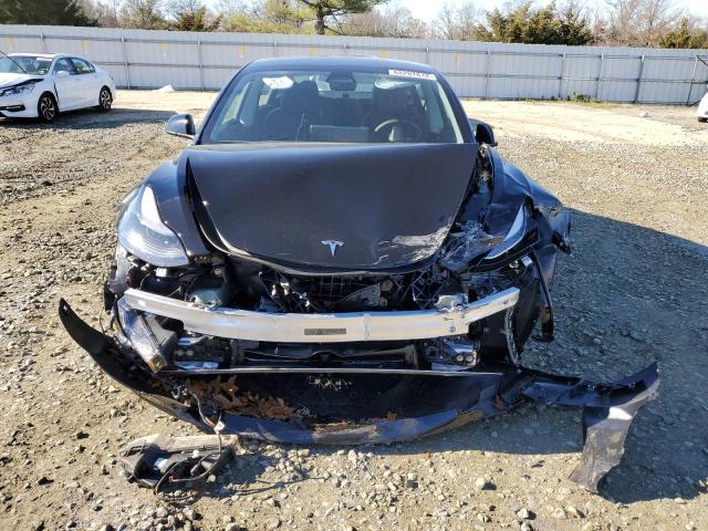 Photo 11 from auction – 2022 TESLA MODEL 3 with VIN 5YJ3E1EB2NF344808