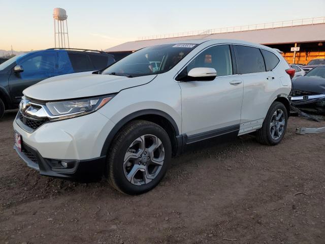 HONDA CR-V EX 2018 with VIN 2HKRW2H52JH671126 - Photo from auction