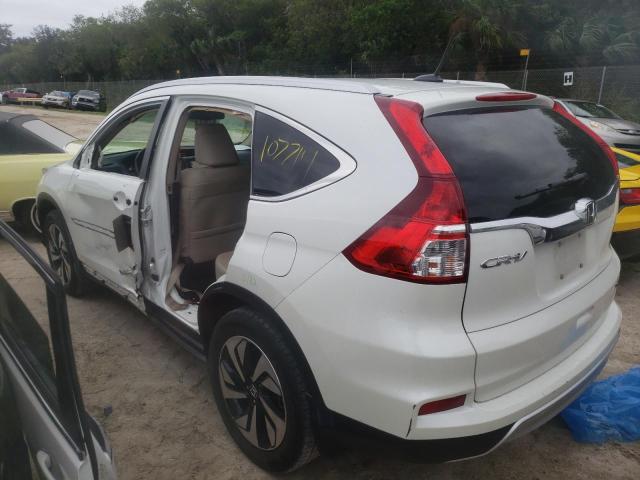 Photo 2 from auction – 2015 HONDA CR-V TOURI with VIN 5J6RM3H94FL017238