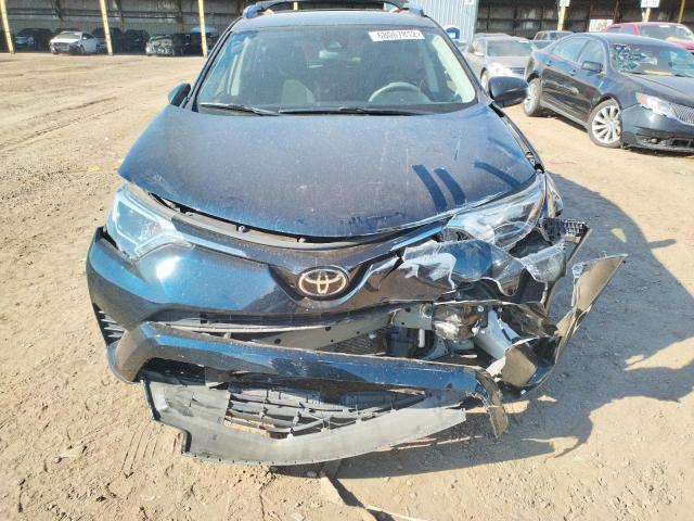 Photo 5 from auction – 2017 TOYOTA RAV4 LE with VIN JTMZFREV0HJ716398