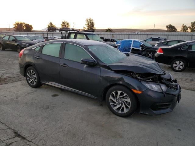 Photo 4 from auction – 2017 HONDA CIVIC EX with VIN 2HGFC2F70HH563799