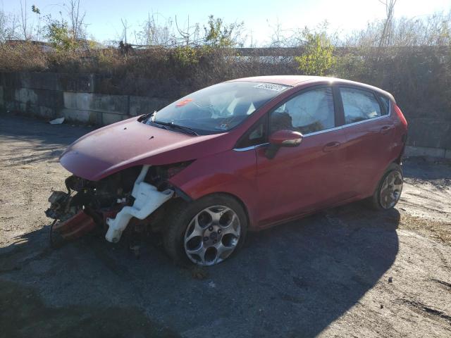 FORD FIESTA SES 2011 with VIN 3FADP4FJ3BM173649 - Photo from auction