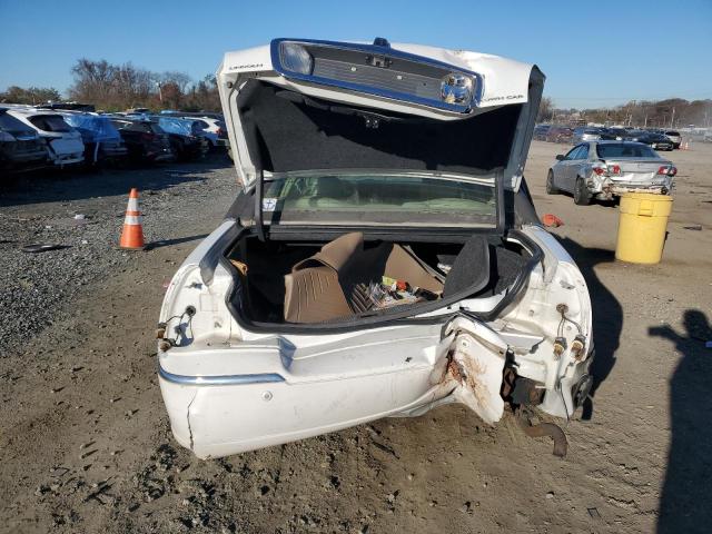 Photo 6 from auction – 2004 LINCOLN TOWN CAR E with VIN 1LNHM81W44Y674020