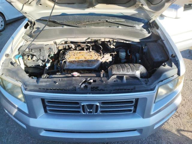 Photo 11 from auction – 2006 HONDA RIDGELINE with VIN 2HJYK16596H551422