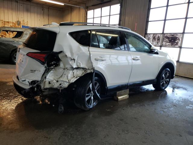 Photo 3 from auction – 2017 TOYOTA RAV4 XLE with VIN JTMRFREV8HJ138535