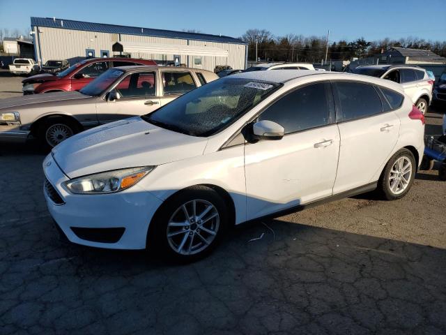 FORD FOCUS SE 2015 with VIN 1FADP3K28FL282057 - Photo from auction