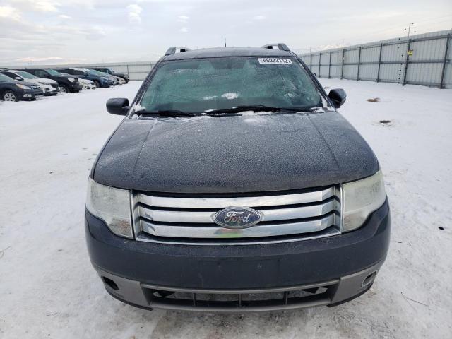 Photo 5 from auction – 2008 FORD TAURUS X S with VIN 1FMDK05W98GA07908