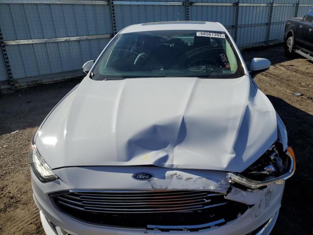Photo 11 from auction – 2018 FORD FUSION SE with VIN 3FA6P0LU4JR128639