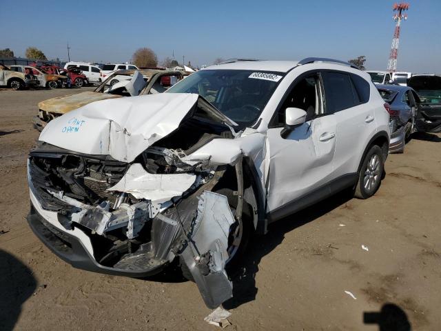MAZDA CX-5 TOURI 2016 with VIN JM3KE2CY5G0735453 - Photo from auction