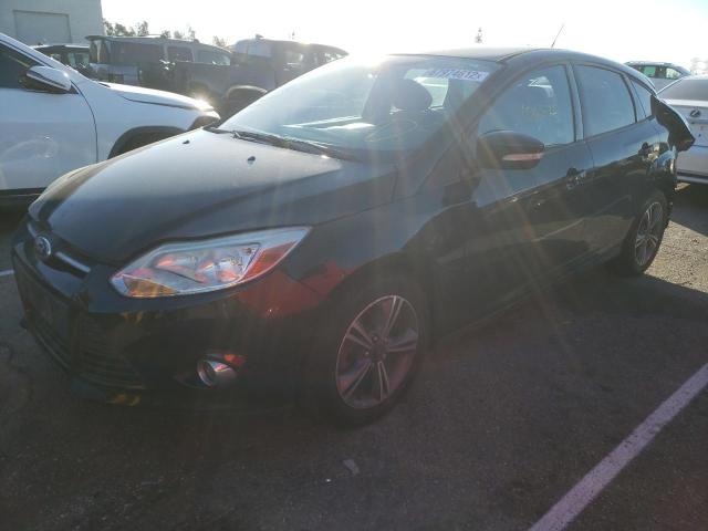 FORD FOCUS SE 2014 with VIN 1FADP3K23EL355494 - Photo from auction
