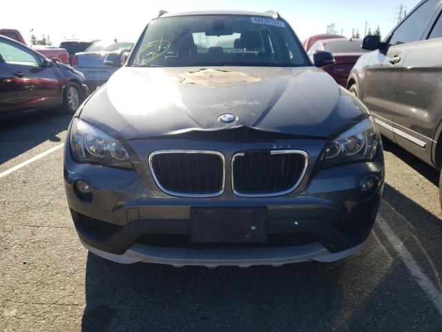 Photo 5 from auction – 2015 BMW X1 SDRIVE2 with VIN WBAVM1C55FVW58588