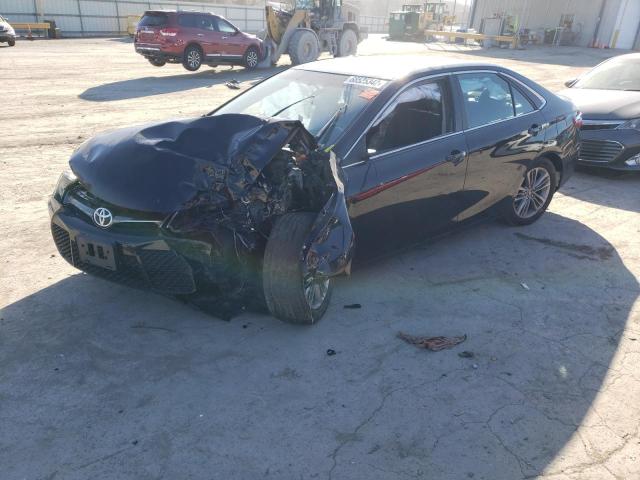 TOYOTA CAMRY LE 2017 with VIN 4T1BF1FKXHU700100 - Photo from auction