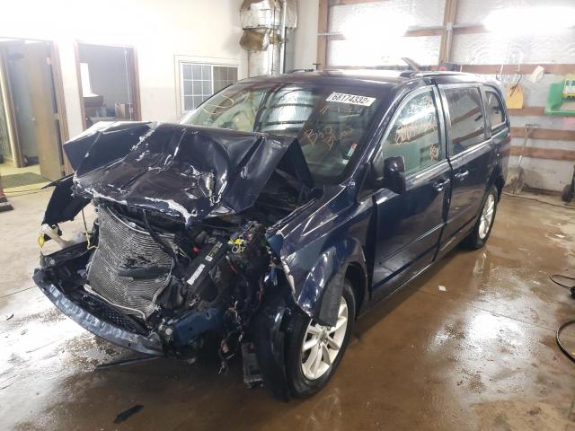 DODGE GRAND CARA 2014 z numerem VIN 2C4RDGCG0ER253197 - Zdjęcie z aukcji