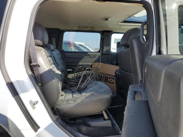 Photo 11 from auction – 2005 HUMMER H2 with VIN 5GRGN23U25H125518