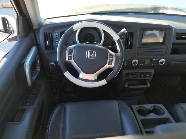 Photo 8 from auction – 2006 HONDA RIDGELINE with VIN 2HJYK16596H551422