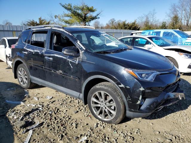 Photo 4 from auction – 2016 TOYOTA RAV4 LIMIT with VIN 2T3DFREV6GW476025