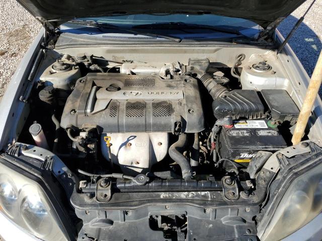 Photo 11 from auction – 2004 HYUNDAI TIBURON with VIN KMHHM65D24U128918