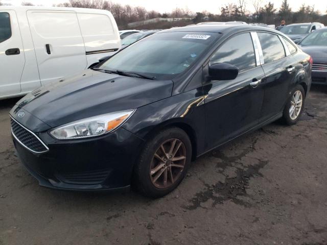 FORD FOCUS SE 2018 with VIN 1FADP3F28JL295250 - Photo from auction