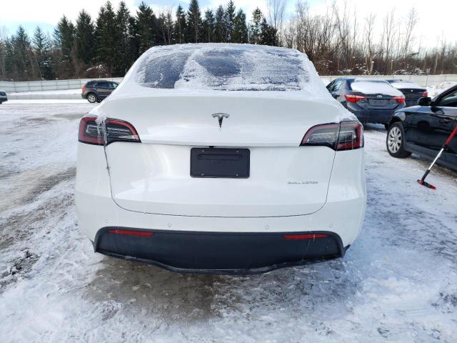 Photo 6 from auction – 2021 TESLA MODEL Y with VIN 5YJYGDEE7MF228577