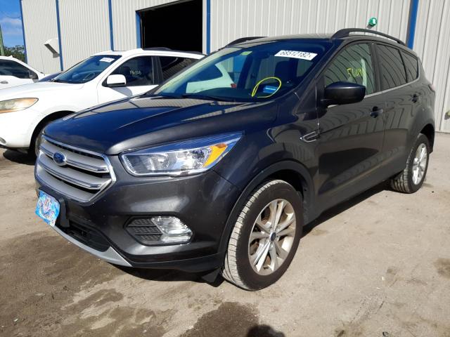 FORD ESCAPE SE 2018 with VIN 1FMCU9GD4JUD15484 - Photo from auction