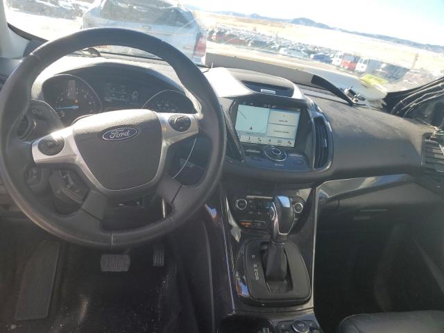 Photo 8 from auction – 2016 FORD ESCAPE TIT with VIN 1FMCU9JX4GUA51646