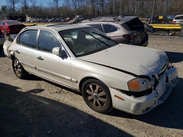 Photo 4 from auction – 2004 KIA OPTIMA LX with VIN KNAGD128445358624