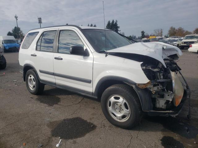 Photo 4 from auction – 2002 HONDA CR-V LX with VIN JHLRD68402C003491