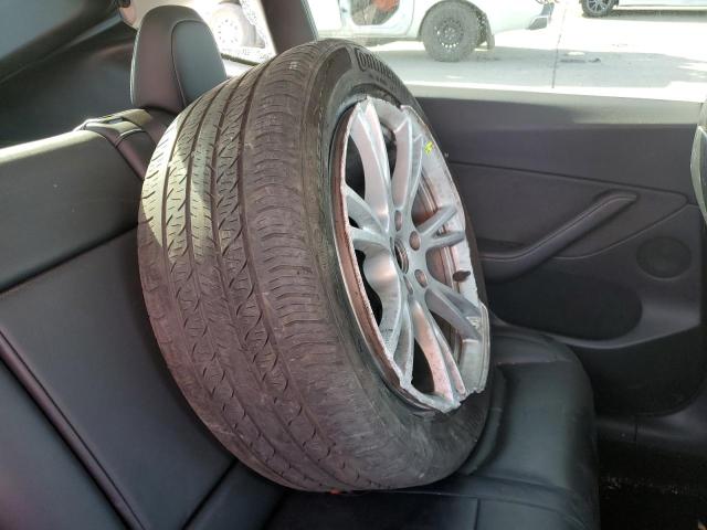 Photo 12 from auction – 2021 TESLA MODEL Y with VIN 5YJYGDEE6MF218512