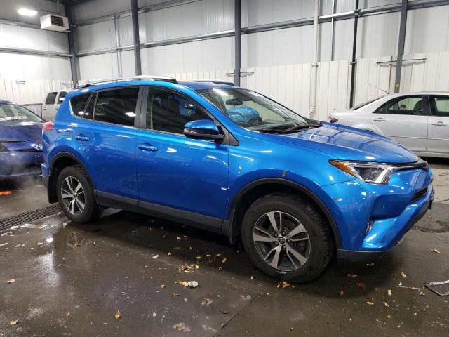 Photo 4 from auction – 2017 TOYOTA RAV4 XLE with VIN JTMRFREV8HJ120598