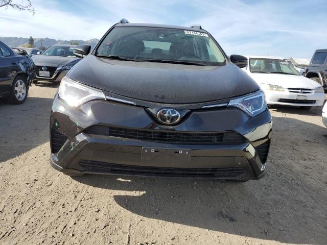 Photo 5 from auction – 2018 TOYOTA RAV4 LE with VIN 2T3ZFREV6JW430546