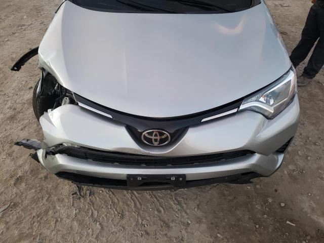 Photo 12 from auction – 2018 TOYOTA RAV4 LE with VIN 2T3BFREV8JW746354