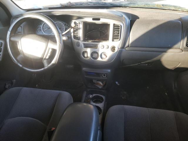 Photo 8 from auction – 2004 MAZDA TRIBUTE LX with VIN 4F2YZ04104KM00629
