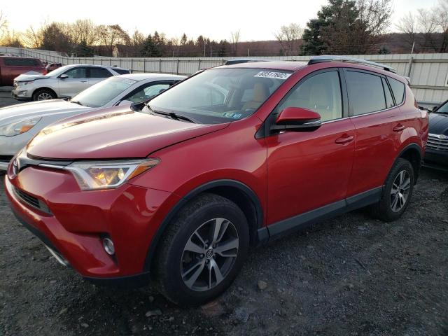 TOYOTA RAV4 XLE 2016 with VIN JTMRFREV4GJ083838 - Photo from auction