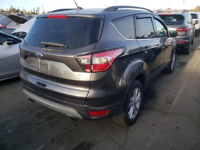 Photo 3 from auction – 2018 FORD ESCAPE SE with VIN 1FMCU0GD2JUC19543