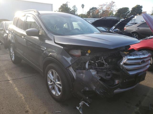 Photo 4 from auction – 2018 FORD ESCAPE SE with VIN 1FMCU0GD2JUC19543