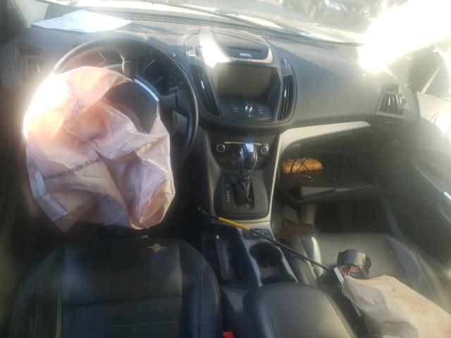 Photo 8 from auction – 2014 FORD ESCAPE SE with VIN 1FMCU9GX2EUC80668