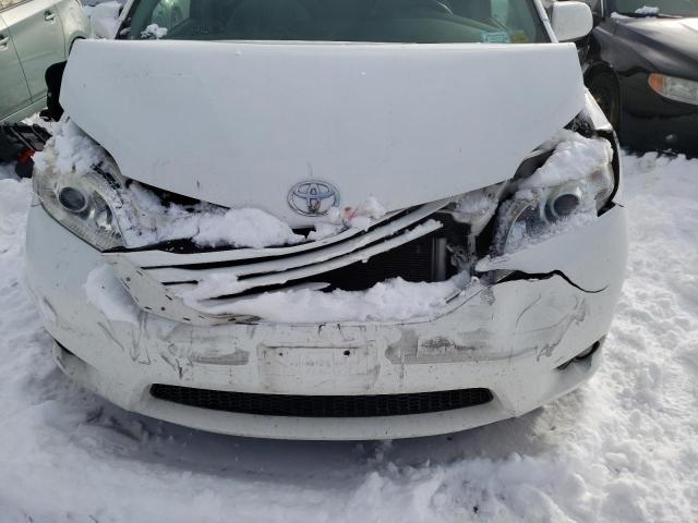 Photo 12 from auction – 2015 TOYOTA SIENNA LE with VIN 5TDJK3DC6FS101750