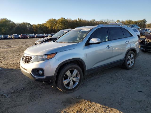 KIA SORENTO EX 2013 with VIN 5XYKU4A62DG355422 - Photo from auction