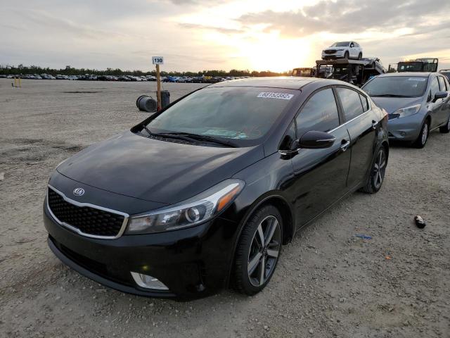 KIA FORTE EX 2018 with VIN 3KPFN4A88JE166766 - Photo from auction