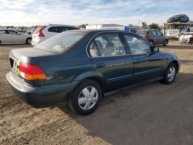 Photo 3 from auction – 1997 HONDA CIVIC EX with VIN JHMEJ8643VS005702