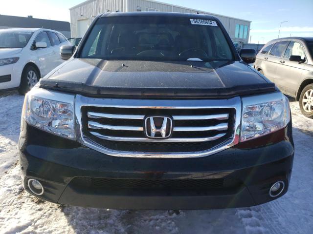 Photo 5 from auction – 2014 HONDA PILOT TOUR with VIN 5FNYF4H91EB504741