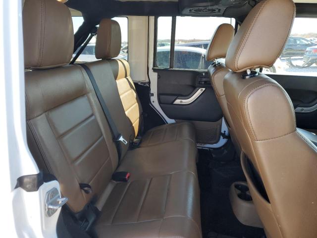 Photo 11 from auction – 2011 JEEP WRANGLER U with VIN 1J4BA5H17BL618315