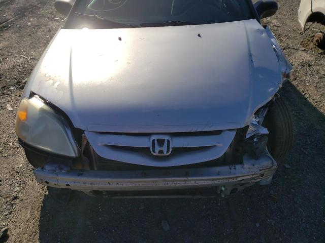 Photo 11 from auction – 2003 HONDA CIVIC LX with VIN 1HGEM22593L065254