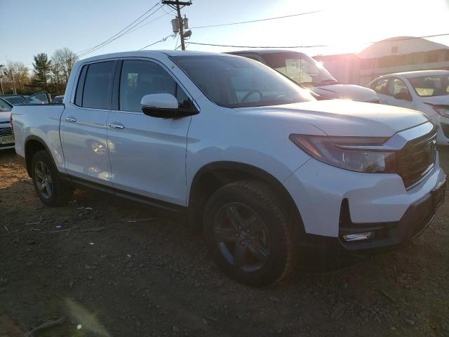 Photo 4 from auction – 2022 HONDA RIDGELINE with VIN 5FPYK3F73NB034579