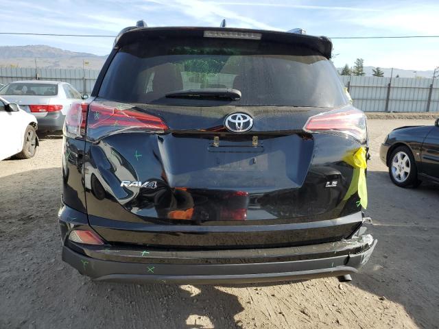 Photo 6 from auction – 2018 TOYOTA RAV4 LE with VIN 2T3ZFREV6JW430546