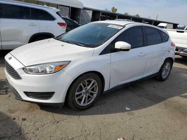 FORD FOCUS SE 2015 with VIN 1FADP3K29FL326437 - Photo from auction