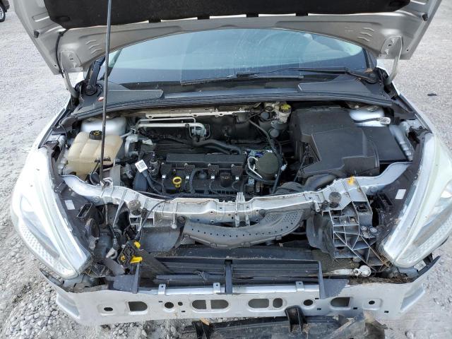 Photo 11 from auction – 2015 FORD FOCUS S with VIN 1FADP3E2XFL362827