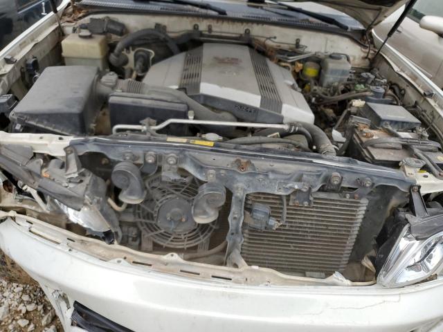 Photo 11 from auction – 1999 LEXUS LX 470 with VIN JT6HT00W6X0032905